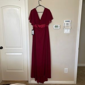 Long formal dress, burgundy color, size 16.